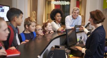 Children smile on a school field trip